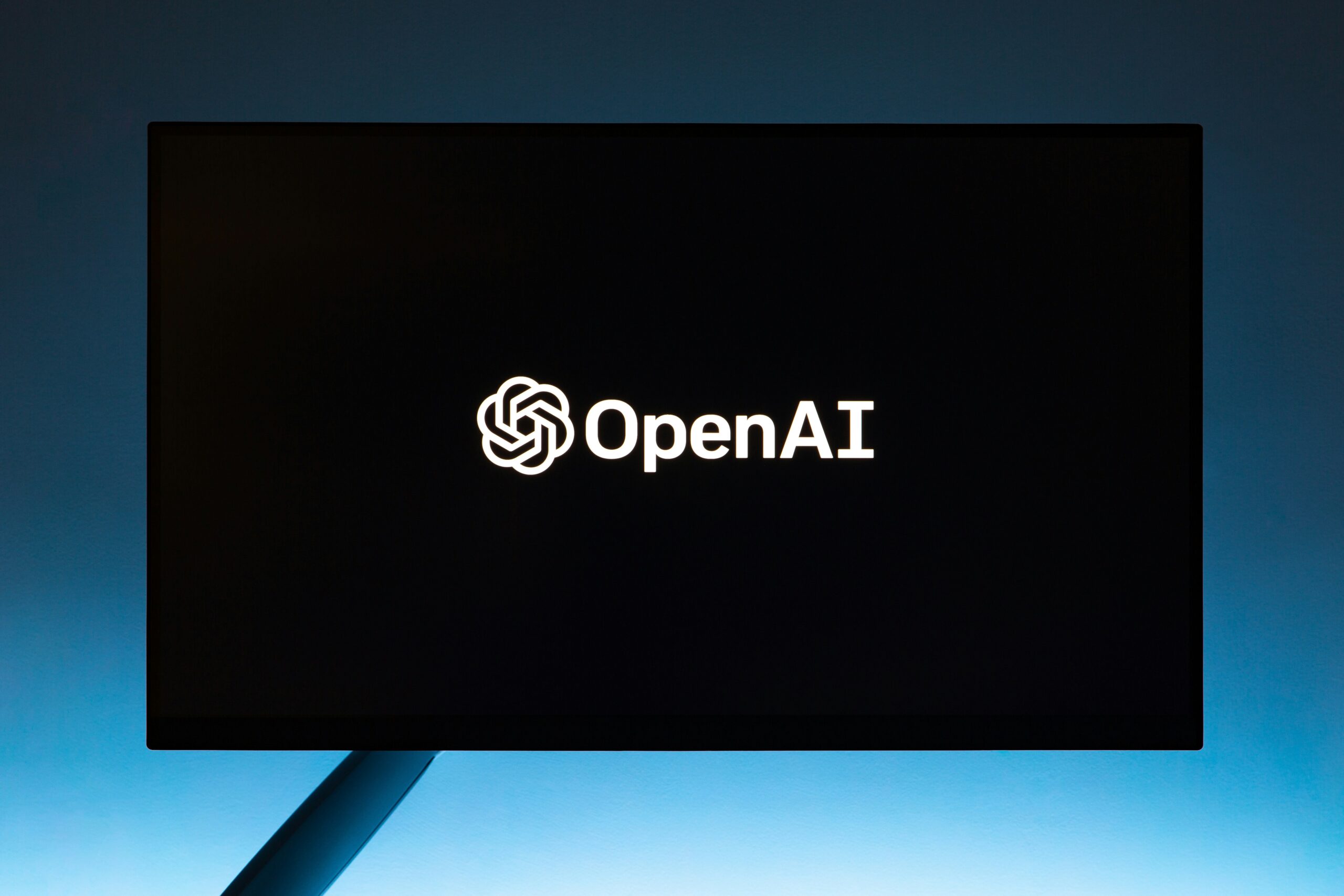 OpenAI logo on computer screen representing AI chatbot