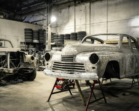 white vintage car in garage