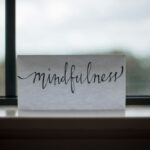 Mindfulness printed paper near window