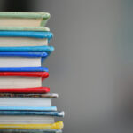 A collection of books representing artificial intelligence education