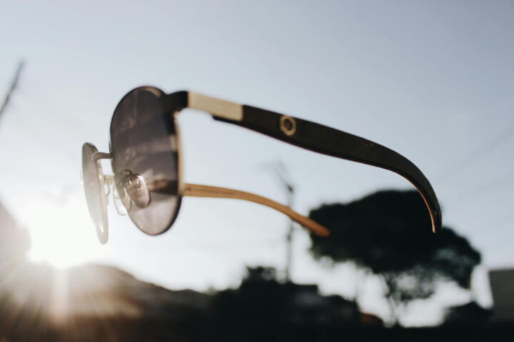 Floating black and silver Aviator sunglasses representing augmented reality smart glasses