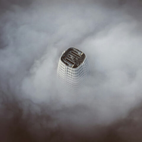 Salesforce CRM building with foggy sky