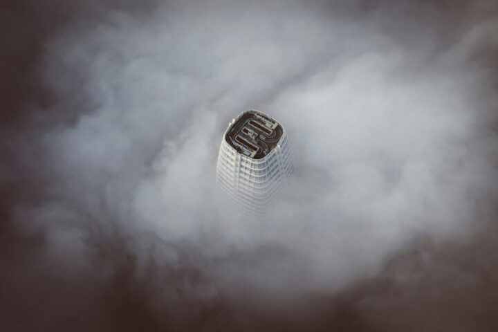Salesforce CRM building with foggy sky