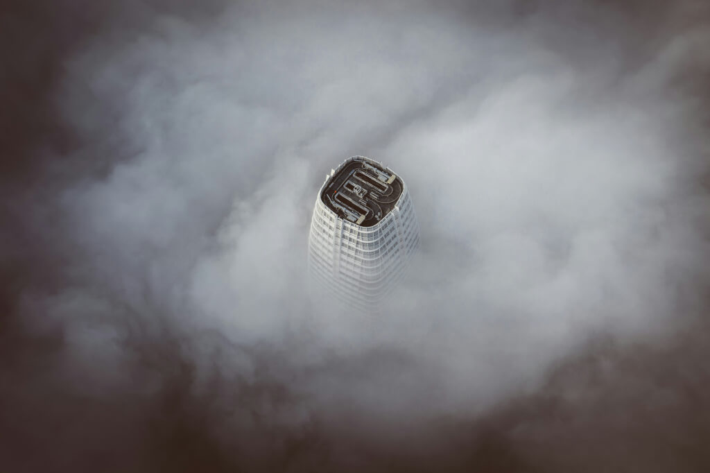 Salesforce CRM building with foggy sky